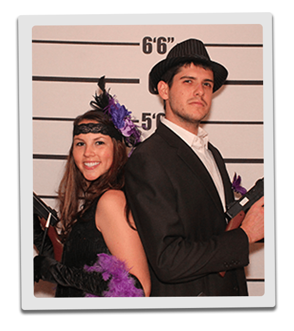 Portland Murder Mystery party guests pose for mugshots