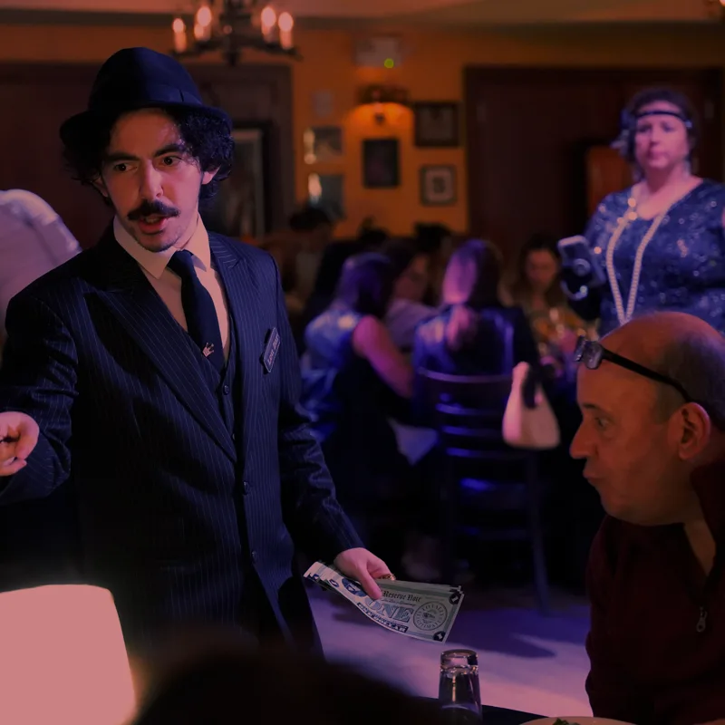 A detective questioning a guest at a Portland show