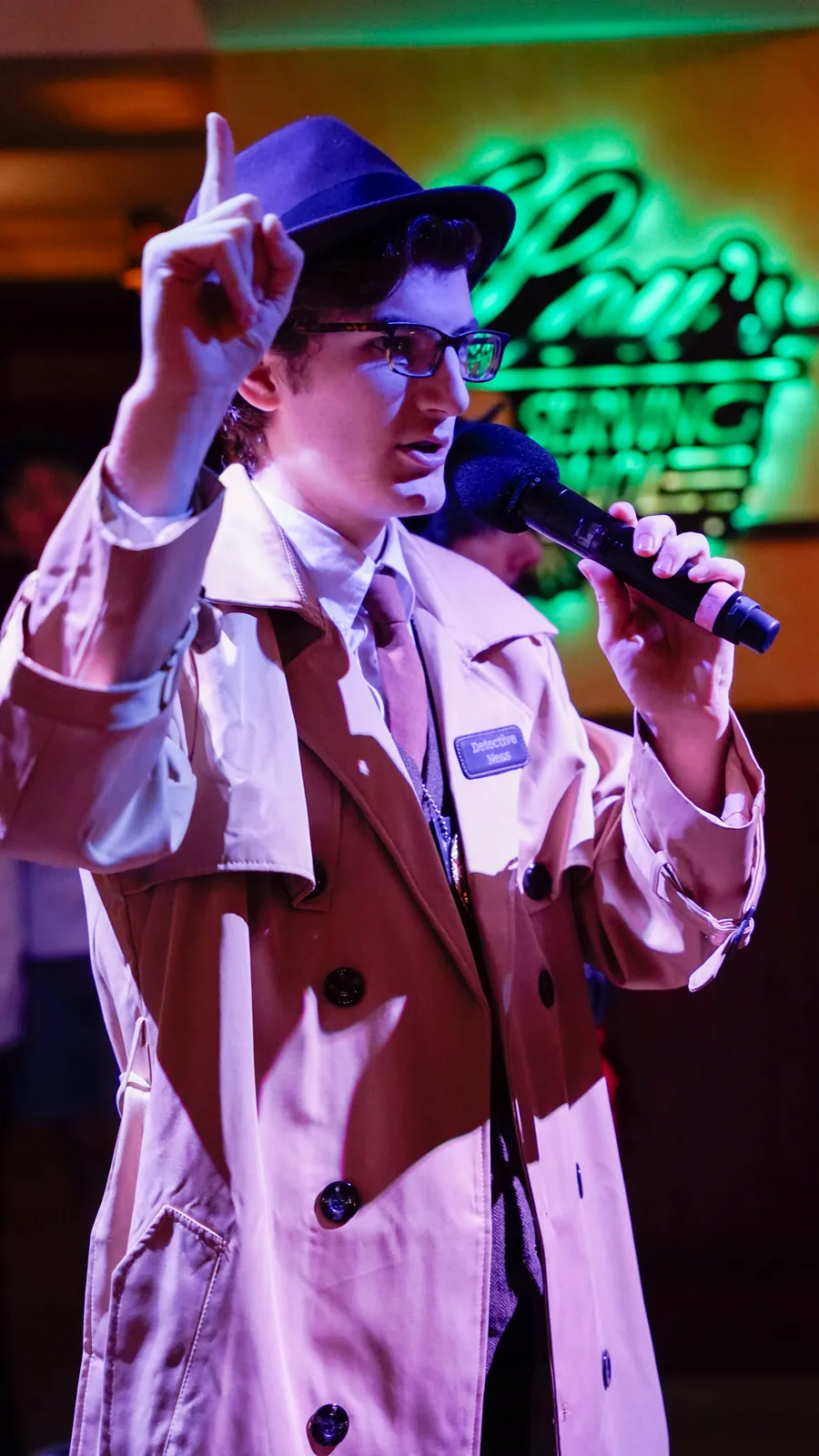 A Murder Mystery Company actor working the room at a Portland show